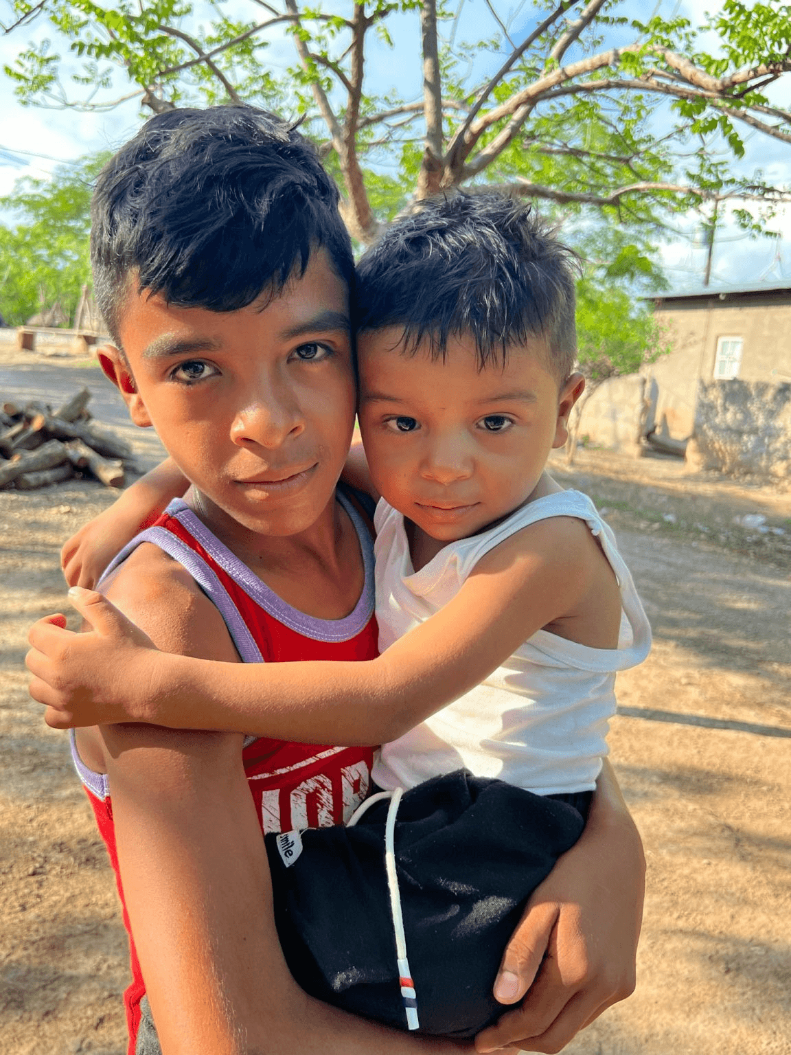 Eithan with his older brother, who sometimes helps him during Special Needs class